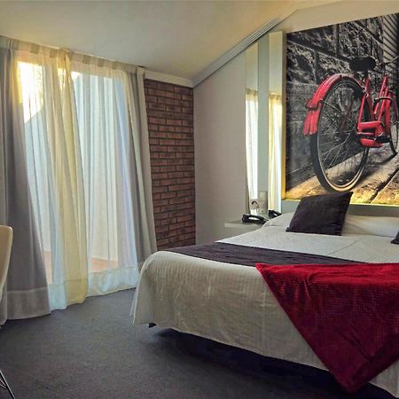 Hotel Spa El Muelle De ซวนเซส ภายนอก รูปภาพ